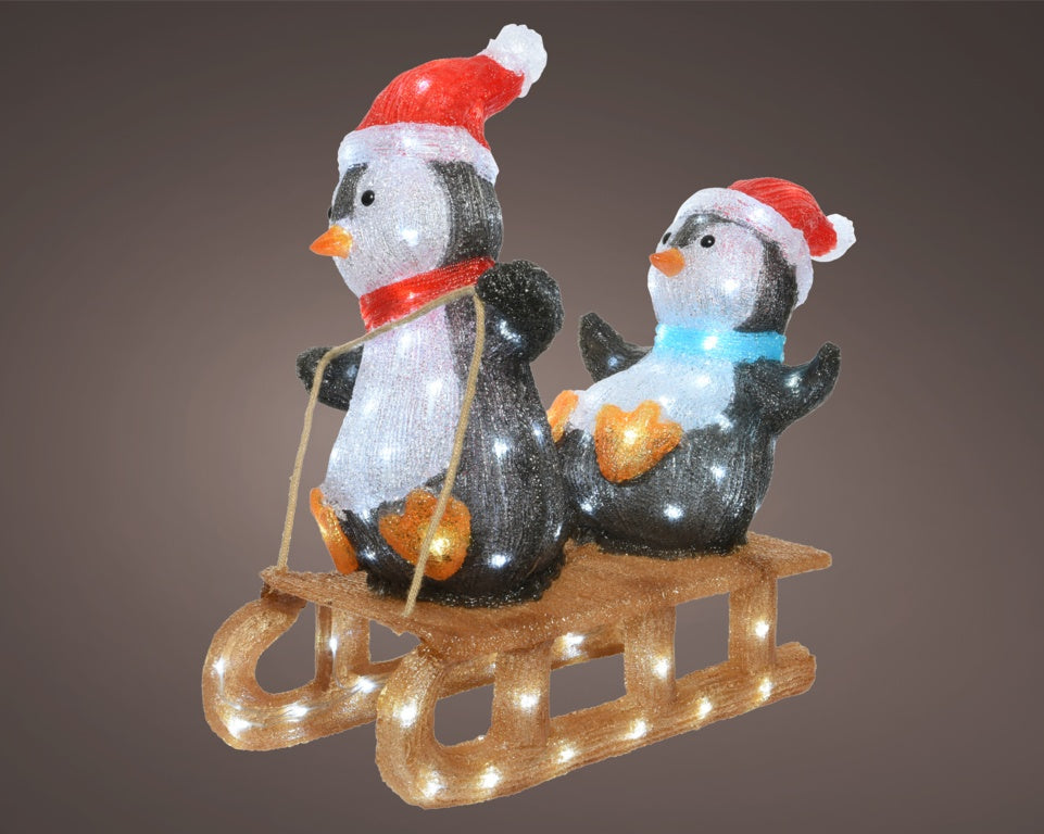 LED penguins on sled